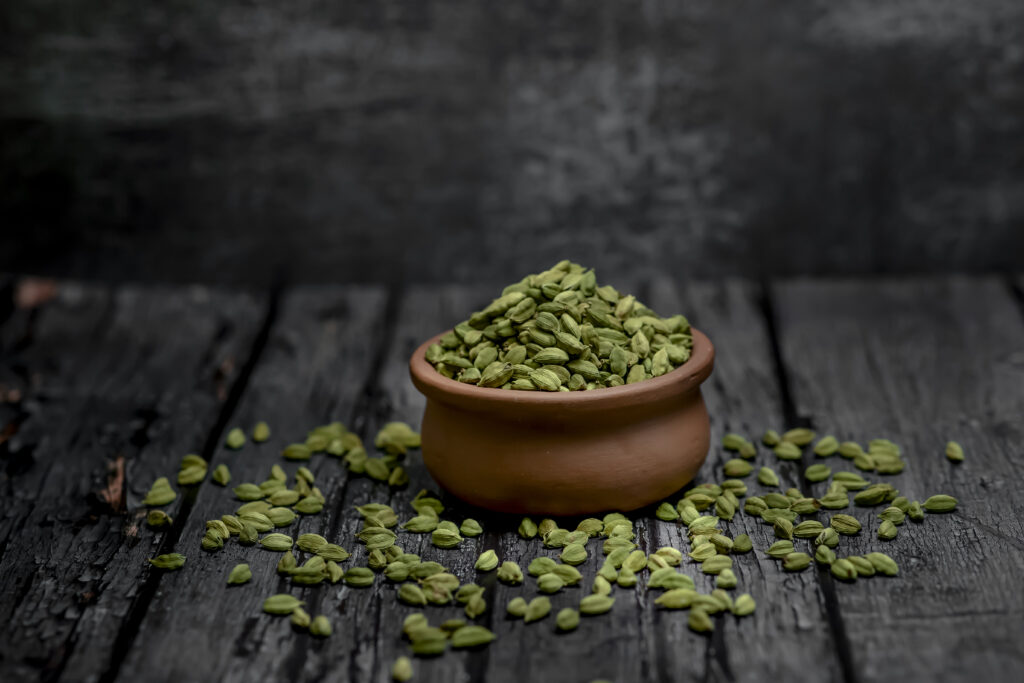 cardamom in wooden jar