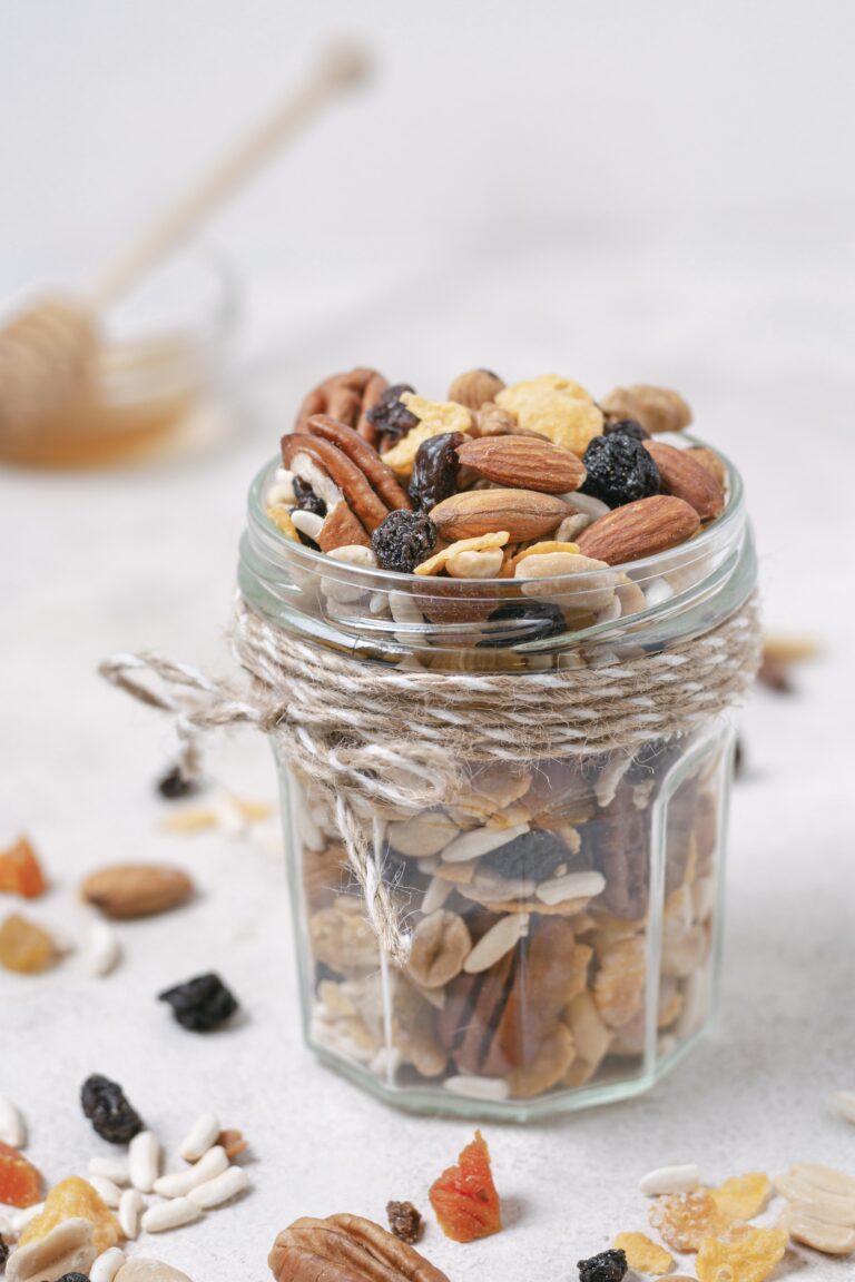 Dry fruits are placed on a glass jar